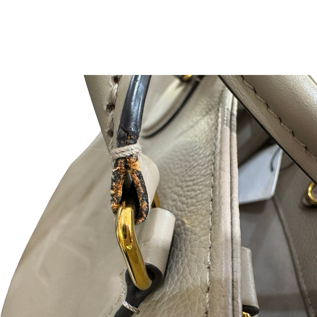 Louis Vuitton On The Go Mm Monogram Empreinte Leather