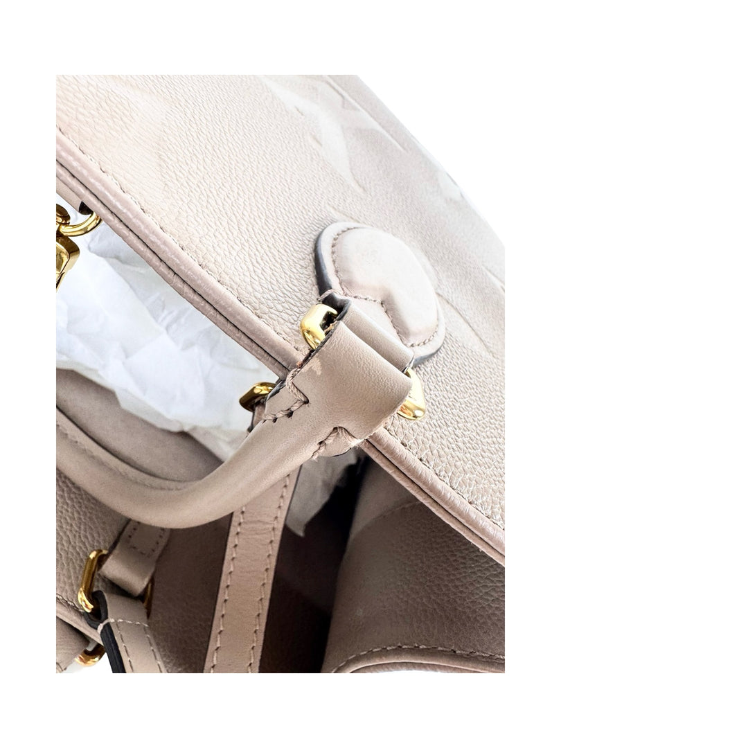 Louis Vuitton On The Go Mm Monogram Empreinte Leather