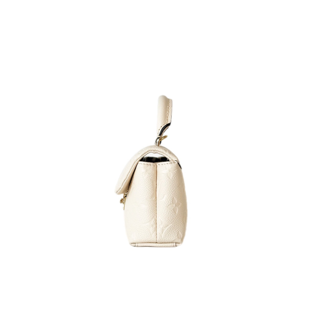 Louis Vuitton Madeleine Monogram Empreinte Calfskin White Bag