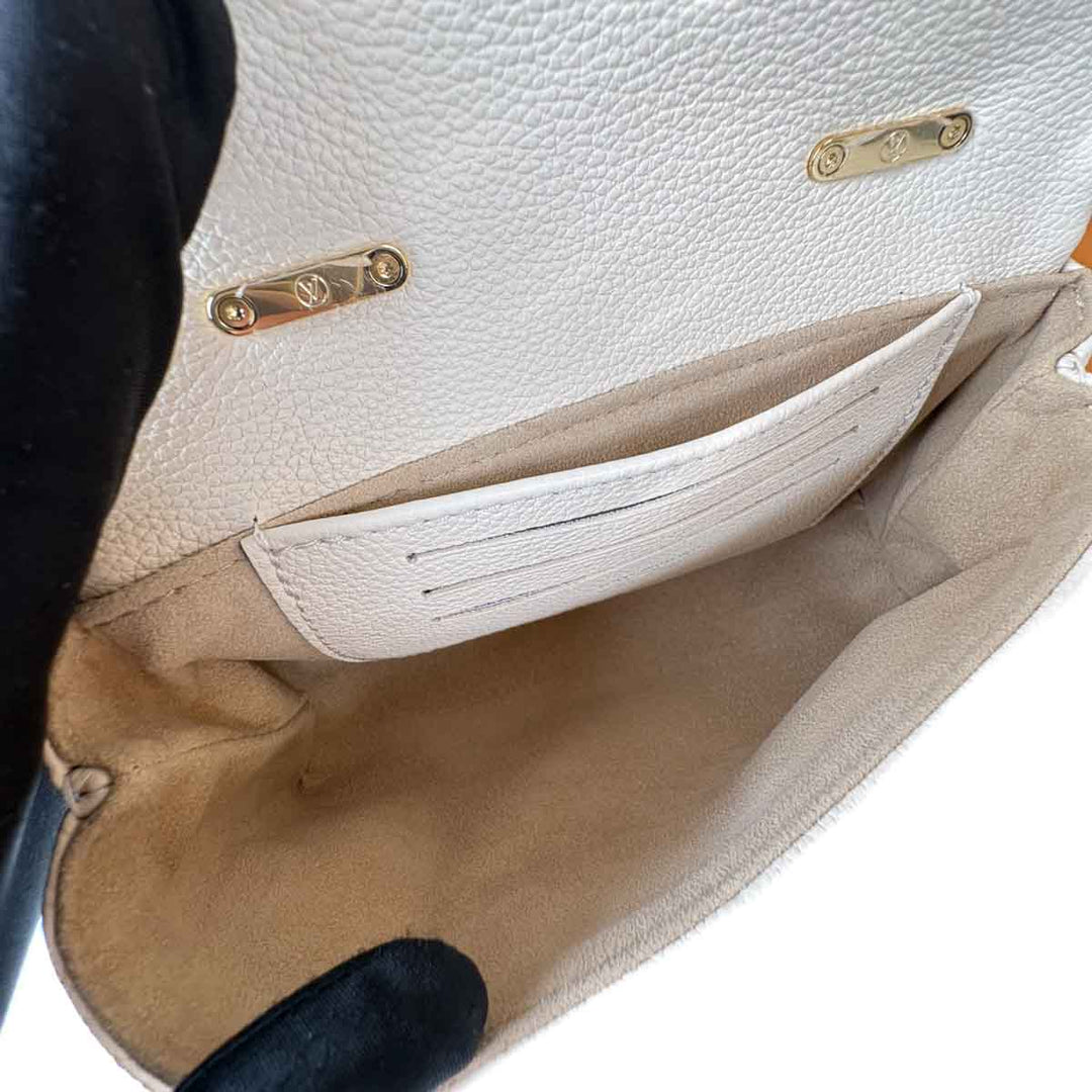 Louis Vuitton Madeleine Monogram Empreinte Calfskin White Bag