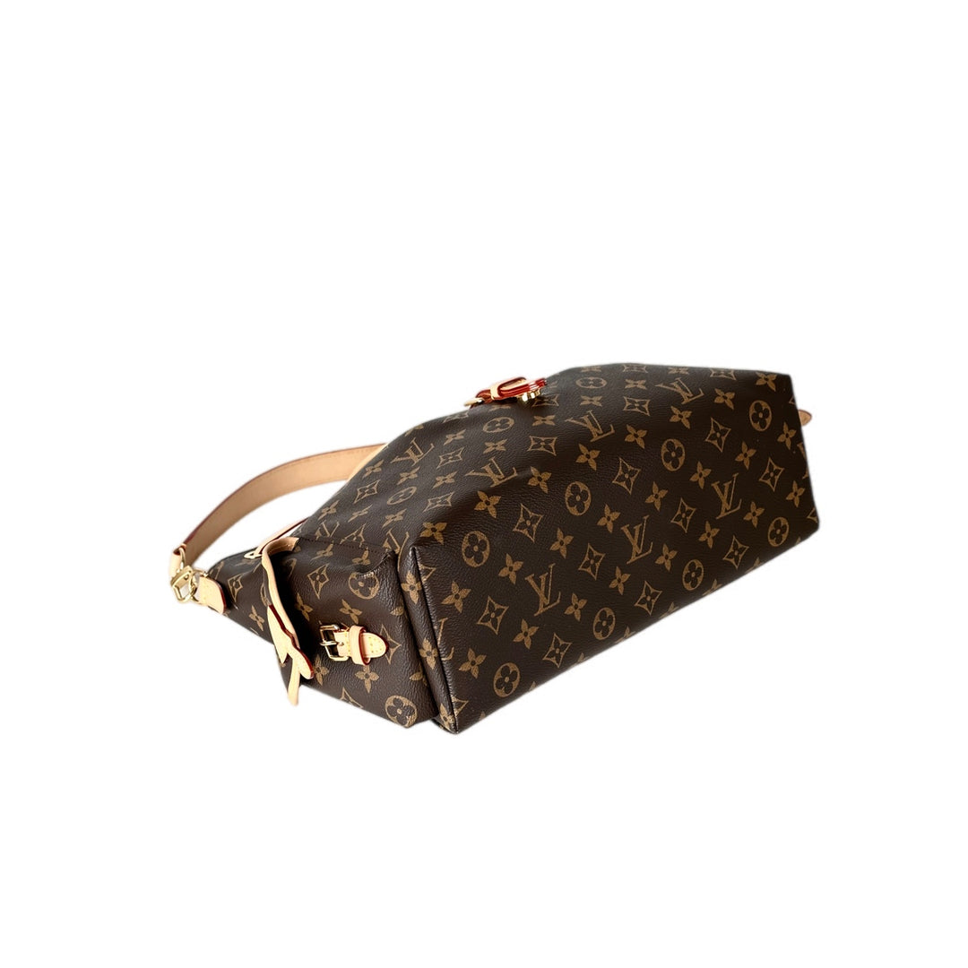Louis Vuitton Odyssee MM Monogram Canvas Handbag