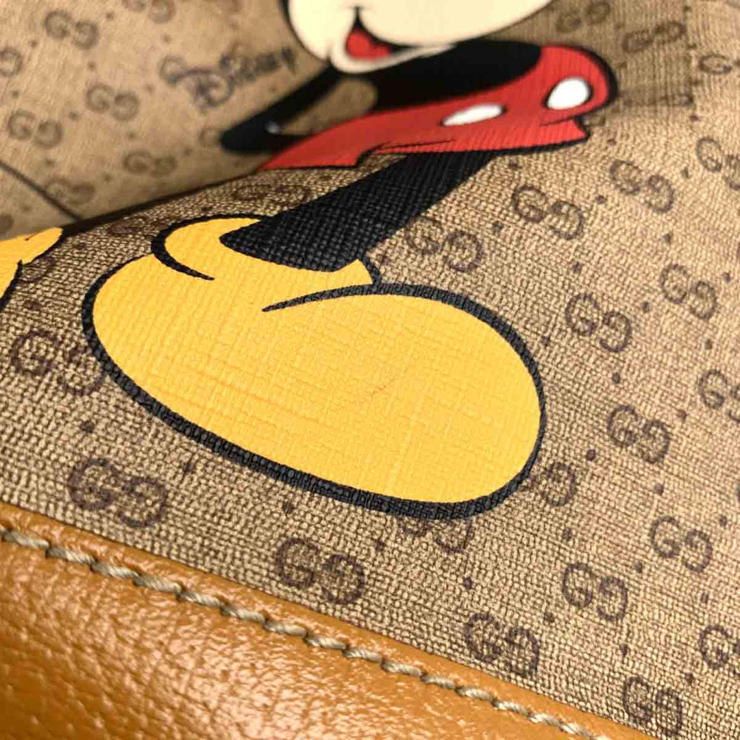 Gucci x Disney GG Supreme Bucket Bag